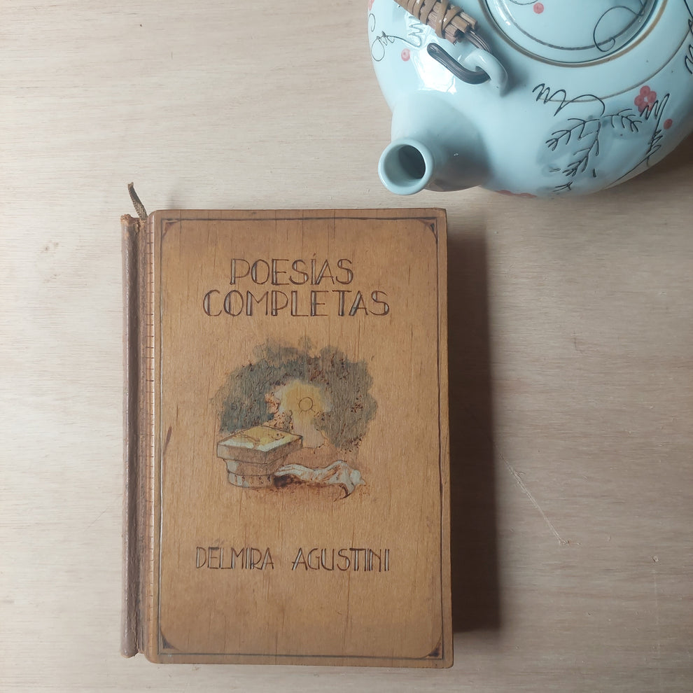 Poesías completas Delmira Agustini. 1944, tapas de madera