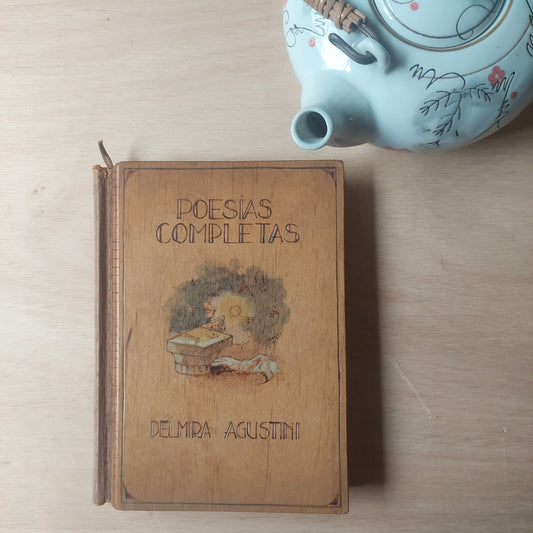 Poesías completas Delmira Agustini. 1944, tapas de madera